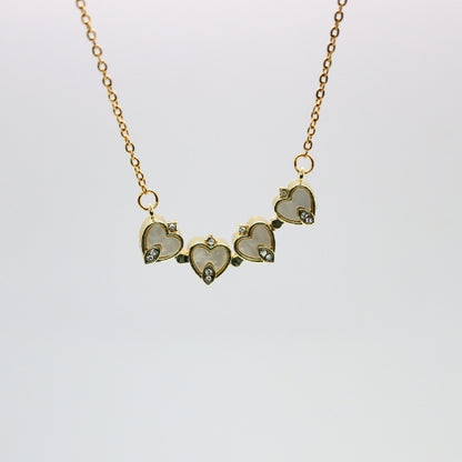 Klavertje vier ketting / hartjes ketting goud (parel) Sfeerbeeld