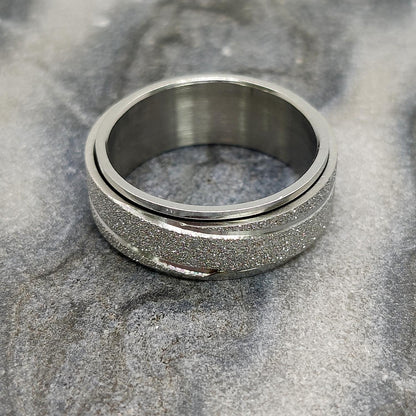 Anxiety ring (Glitter/Streep) Zilver Sfeerbeeld op marmer
